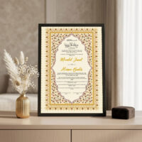 Golden Floral Arch Nikkah Certificate Black frame on console beside golden vase