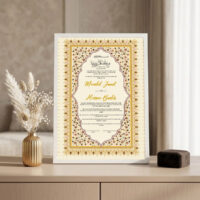 Golden Floral Arch Nikkah Certificate White frame on console beside golden vase