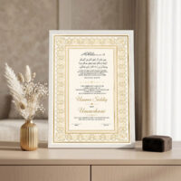 Gold Nikah Frame White frame on console beside golden vase