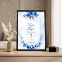 royal blue floral nikah invitation frame Black frame on console beside golden vase