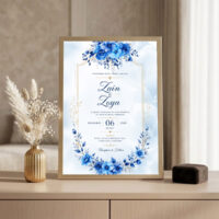 royal blue floral nikah invitation frame Golden frame on console beside golden vase