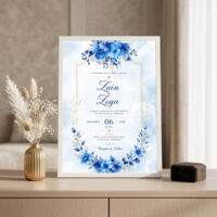 royal blue floral nikah invitation frame White frame on console beside golden vase